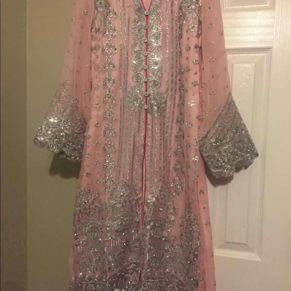 Beautiful new designer dress . Size M/L